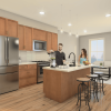 rendering of kitchen with people making food