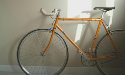 a bicycle parked in a room