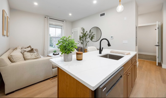 Open space living area with natural lighting